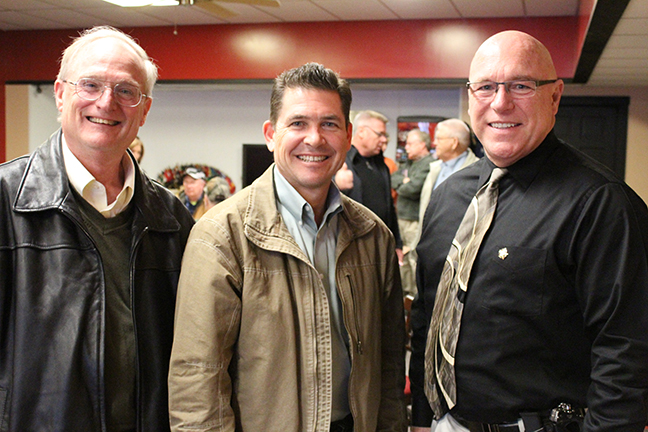 Photo by Mike Brothers Candidate McCarter Visits Sullivan A meet and greet for Republican State Senator Kyle McCarter from the 54th District was held at TnT Pizzeria Tuesday, January 26. The current state senator from Lebanon is a primary candidate seeking nomination for the 15th Congressional District seat held by Republican John Shimkus. Pictured above: Moultrie County Board chairman Dave McCabe, Senator McCarter and sheriff Chris Sims.