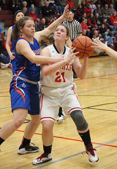 Photo by Darian Hays Payton Wellbaum scored seven of the next 13 points for the Lady Knights extending the lead to 17-7 with under a minute remaining in the first quarter.