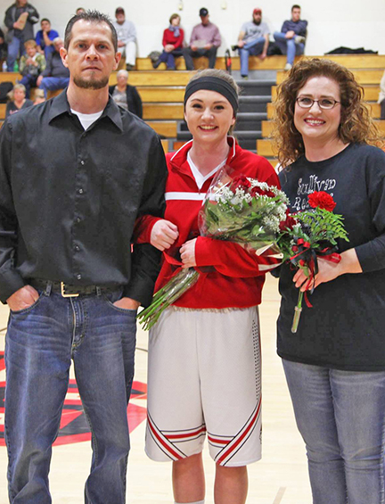 Photo by Lisa Dickens Senior Night in Sullivan honored senior Alyssa Marshall, whose parents Mike and Venessa were present for the celebration.