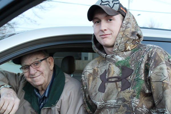 Photo by Mike Brothers Who reached 21 first? C.J. Walker (right) actually turned 21 February 14, before great-grandfather Tom Florey turns 21 on February 29.