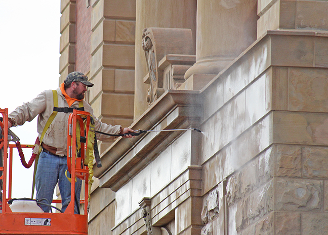 Photo by RR Best Final touches Final touches are being put on the Moultrie County Courthouse restoration project this week. Masons Masonry Restoration of Brownstown was awarded the $203,755 bid to repair stone and tuckpointing on the 112 year old structure in August 2015. Above a Mason employee is placing the final sealer on repairs to complete the project.