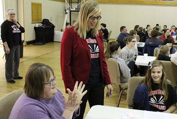 Photo by Mike Brothers One Book One Sullivan community discussion at the First United Methodist Church was held last week. Above high school teacher Becky Lawson, One Book coordinator Rikki Ray and table leader sixth grader Lilly Graham discuss the book while One Book volunteer partner Cheryl Wildman, special education teacher, watches in the background.