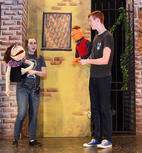 Photo Submitted Brianna Creviston (Kate Monster) and Nick Tipsword (Princeton) rehearse a scene for Okaw Valley High School’s April 22 & 23 production of “AVENUE Q: School Edition.”