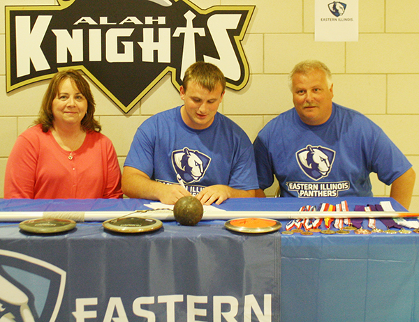 Photo furnished Yeakley Signs with EIU ALAH track stand out Colton Yeakley signed his letter of intent to participate in Eastern Illinois University track and field. At the signing on May 11 at the high school gym were Colton’s mother Heidi and father Steve. Colton displayed shot put, javelin and discus on the signing table.  