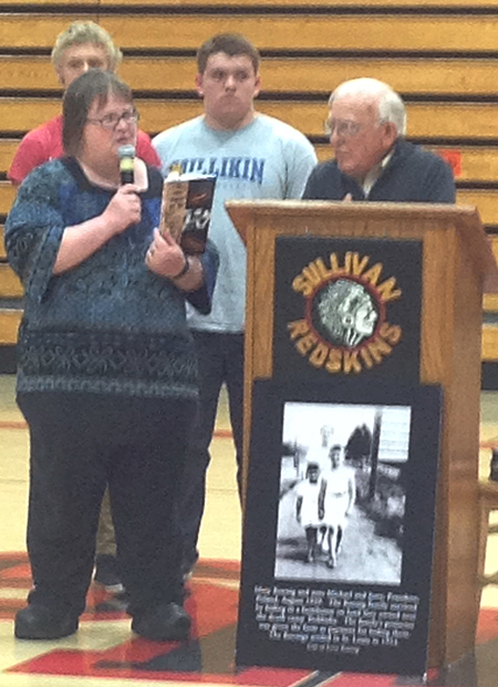 Photo courtesy Jessica Voyles Sullivan High School English teacher Rebecca Lawson left introduces Holocaust survivor Jerry Koenig, who gave his account of Poland under the  Nazis during World War II.