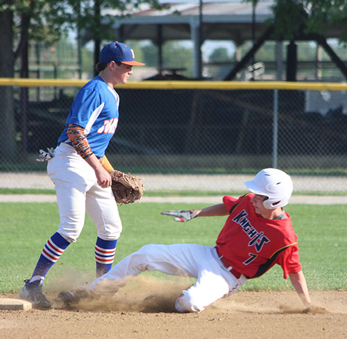 Photo by Darian Hays ALAH Knight Brad R. Miller beats the throw during the Argenta Oreana home game last week.