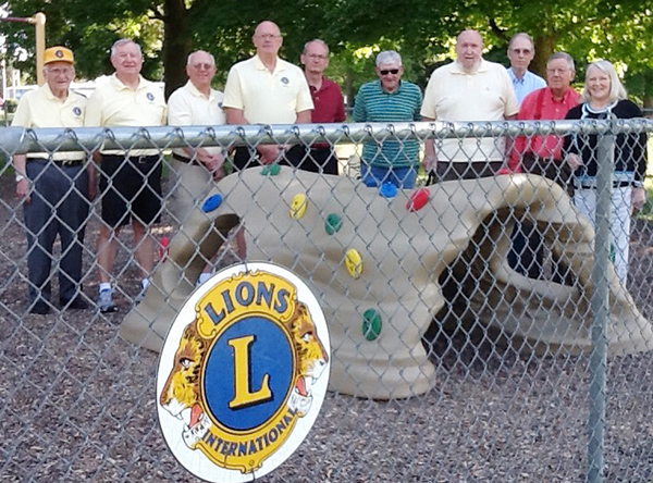 Photo furnished Lions Donate Discovery Cave Sullivan Lions Club recently donated the Discovery Cave in the preschool area in Wyman Park. Members pictured are John Ruscin, Dave Walker, Dick Martin, Bob White, Dave Reed, Jess Barker, Ed Taylor, Roger Tice, Bob Elder, and Verna Tice.