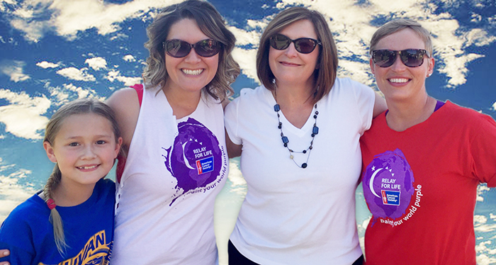 Photo furnished Relay’s 20th Anniversary Relay for Life participants Emily Crosier, Jamie Crosier, Diane Waggoner and Jessi Jess take a moment during the 20th anniversary event held June 11 at Wyman Park.