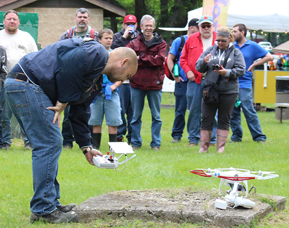 Photo by RR Best Sullivan Fire Protection District representative Larry Edwards demonstrates drone operations to Lincoln Trail Council Boy Scouts.