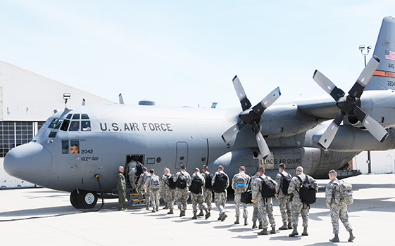 Photo furnished Deploying Airmen of the 183rd Air Operations Group based in Springfield, Illinois, board a C-130 aircraft on the first leg of their journey to duty in the Middle East. Approximately 80 members of the unit will provide command and control of airpower to Air Forces Central Command and are expected to return home in January 2017. (U.S. Air National Guard photo by Master Sgt. Shaun Kerr)