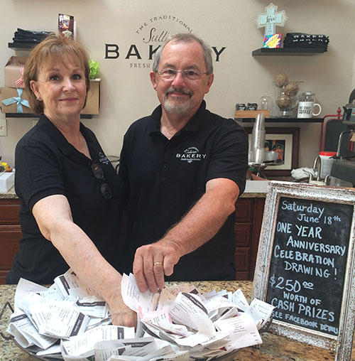 Photo furnished First Anniversary Sullivan Bakery on Harrison Street just celebrated their first anniversary. Owners JoBeth and Jerry Risley drew for winners in the first anniversary cash giveaway. The winners were Melissa Lynch, Becky Freese, Terry Ramsey, Bob Vail, Sue Auten, Jim Palmer, Rena Herschberger, Sandra Buttrick and Drew Campbell.