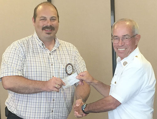 Photo furnished Fireworks Donation Continuing its ongoing support of community projects the Sullivan Rotary Club presented American Legion Post #68 with $1000 for the Fourth of July fireworks display. Above Rotary president Craig Anderson presents a check to Mike Keown of the Sullivan American Legion.