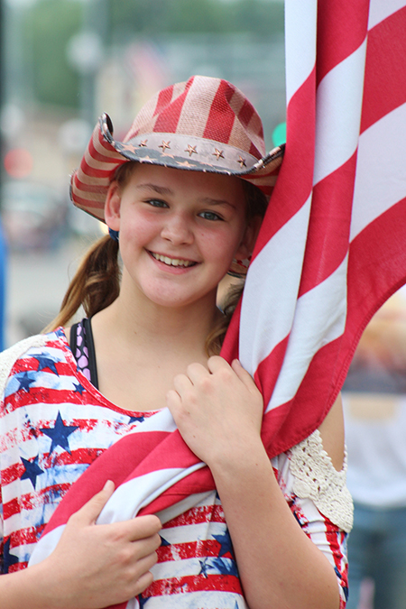 Photo by R.R. Best Salute to Old Glory Lilly Null from Sullivan joined the Fourth of July celebration in full patriotic attire on Independence Day. Sullivan residents and visitors enjoyed the weekend filled with activities at Wyman Park.