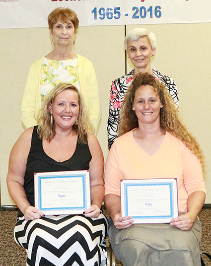 Photo furnished Scholarship Awards from C.E.F.S. Economic Opportunity Corporation recently awarded educational scholarships at their 2016 Annual Board of Directors meeting.  Seated front row (l-r): Jennifer Penberthy and Lynette Green both of Sullivan.  Pictured second row (l-r): CEFS board members Arlene Aschermann and Vickie Bowers.