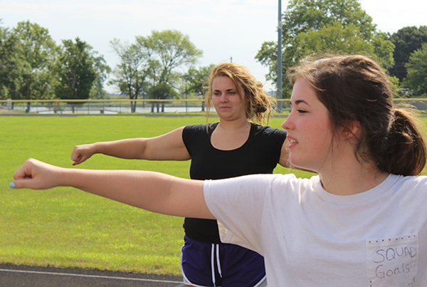 Photo by Brynna Sentel SOV Cheerleading Camp offered training for those competing to make this year’s expanded squad. Above Cassie Freese (front) and Aspen Bridges work on choreography.