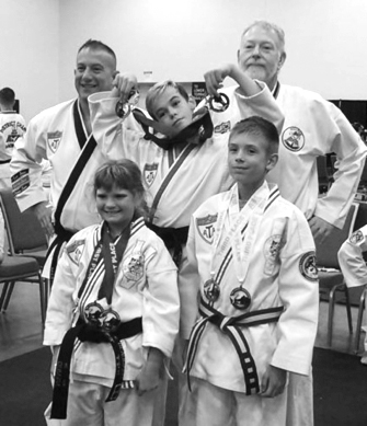 Photo furnished Taekwando testing included: Top left  Paul Kennedy, Steve Deters. Middle row Ashley Brodnansky. Front left, Natalie Beaumont, Trey Talley.