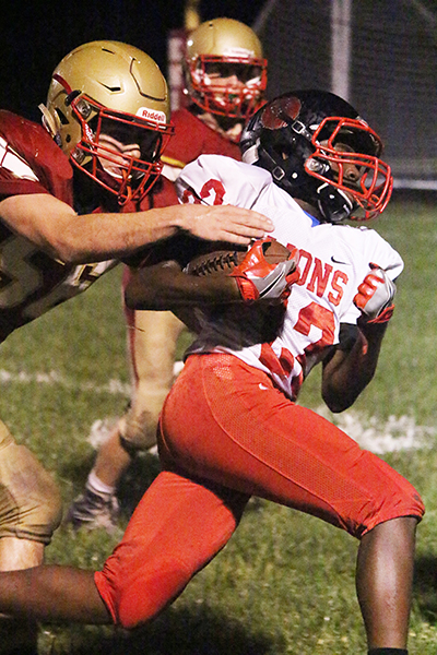 Photo by Darain Hays ALAH Knights’ defense had their hands full during the homecoming game against Decatur Lutheran Association Lions at Wilson Field.