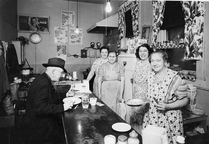 Pictured above is the Blue Front Cafe, which was located on W. Jefferson St. in Sullivan. This photo was taken around the 1940’s. The cafe was owned and operated by Albert & Cora Brown. Pictured left to right are: Nola Wren (cook), Mae Harmison, Bernice Reynolds and Cora Brown. John Webb is the customer at counter. Please submit photos to the News Progress for future consideration. Originals will be saved for return or forwarded to Moultrie County Historical Society. If you have any other information, please contact the Moultrie County Historical Society at 217-728- 4085.