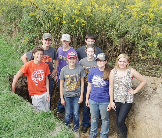 Photo furnished  ALAH FFA members took to the pits at the Section 17 Land Use CDE. Pictured are: (front) Griffin Rose, Makenna Green, Katie Gingerich, and Veronica Chambers; (middle) Taylor Powell, and (back) Adam Hingson, Adam Day, and Koby Stutzman.