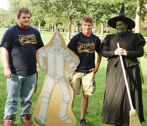 Photo furnished ALAH FFA members Brennan Key and Clayton Young pose with the TIn Man and the Wicked Witch of the West (Dr. Ericka Thieman) at the U of I Greenhand Conference.