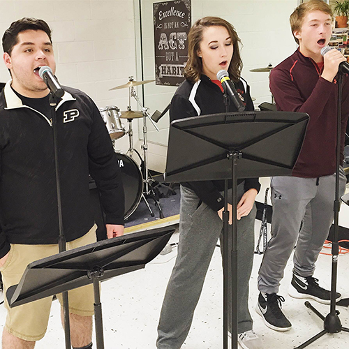 Photo furnished Footloose rehearsals with vocalists Bryce King, Tatum Ellis and Dalton Rogers.