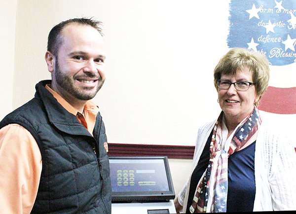 Photo by Mike Brothers Board of Elections Supervisor Kyle Thomas and County Clerk Georgia England during the State Board election equipment testing in Moultrie County last week.