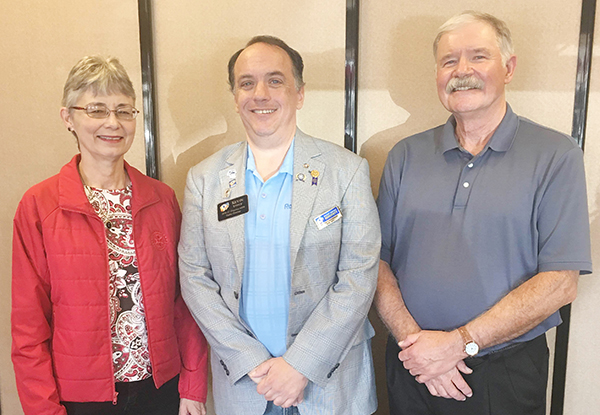 Photo by Emily Stutzman Sullivan Rotary President Dave Cole (from right) Dist. Governor Kevin Younce  and Mary Hodson, Assistant District governor at Oct. 4 meeting. 