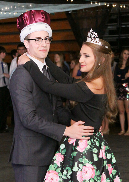 Photo Wurtsbaugh Photography Sullivan Homecoming  Sullivan High School homecoming dance and coronation  were held recently. Above King Charlie Goss and Queen Allyson Will share a dance in the high school gym.