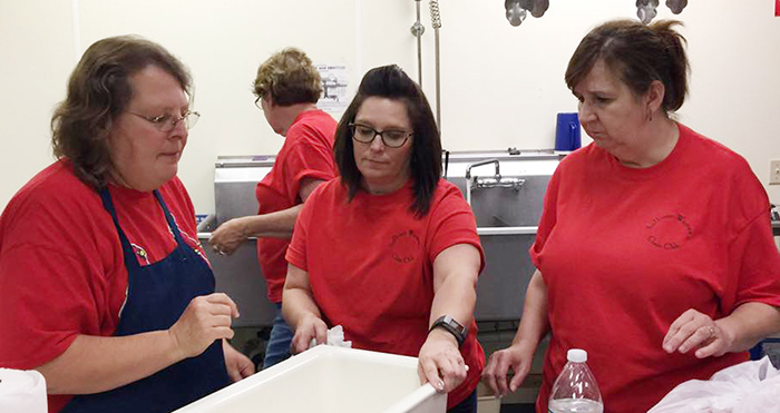 Photo  furnished Pictured preparing for the Sullivan Civic Women’s Club annual chili supper are Jeannie Ashley, Diane Waggoner, Vicky Williams and Johna Sims in the background.