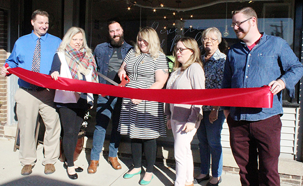 Photo by Mike Brothers Reverie and Rule Sullivan Chamber representatives gathered at the November 4 ribbon cutting ceremony for Reverie and Rule in downtown Sullivan. Pictured from left: City Clerk Monte Johnson, Chamber president Cathrine Craig, Reverie & Rule owners Brett and Chelsea Beery, Hollie Atchison, Lori Harbaugh, and John Stephens. Reverie and Rule offers specialty gifts, stationary and gift cards. 