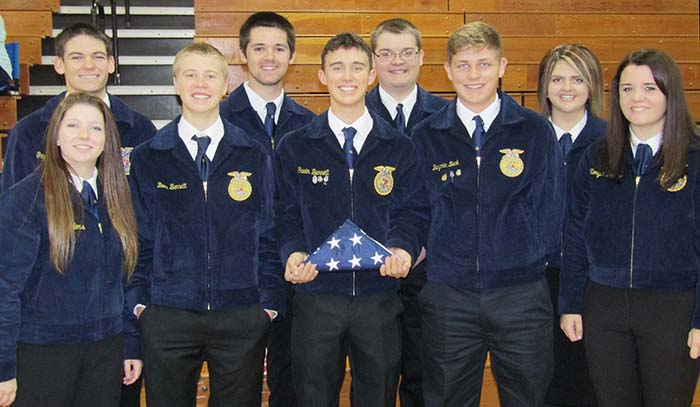 Photo furnished Windsor FFA Honors Veterans The Windsor FFA Chapter showed its support for  veterans Nov. 10. Eight FFA members folded four flags while a ninth member read the symbolism behind each fold. The flag folding ceremony took place during the Veterans Day assembly at Windsor High School.  Advisor Emily Perry also played taps at the end of the assembly. The members participating in the ceremony were front row (left to right) Gillian Sanders, Beau Bennett, Gavin Bennett, Ben Beck, Morgan Lesko. Back row (left to right) Gage Sattler, Travis Fox, Tristan Boehm, and Mackenzee Hooten.  